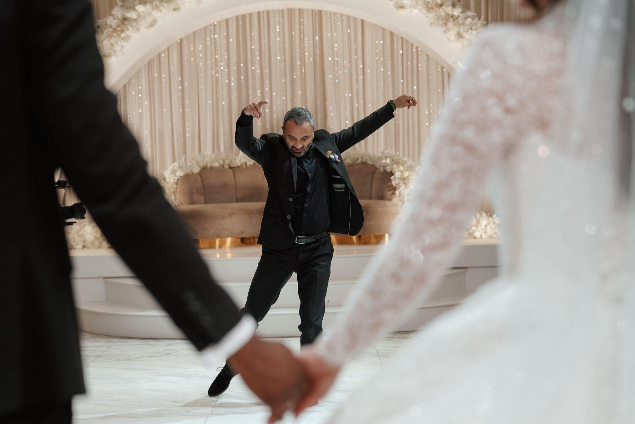 Zeybek dancer performing at a wedding
